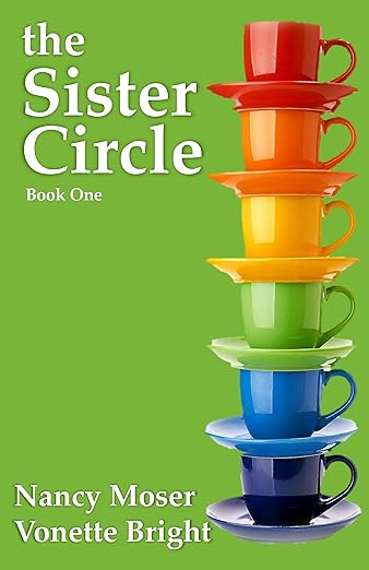 the sister circle, stack of teacups of all different colors